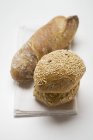 Wholemeal rolls on linen cloth — Stock Photo