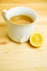 Cup of lemon tea — Stock Photo