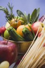 Fresh vegetables, fruits and spaghetti pasta — Stock Photo
