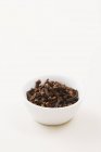 Bowl of dried cloves — Stock Photo