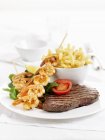 Beef steak and fried potato chips — Stock Photo