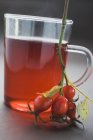 Rose hip tea in cup — Stock Photo