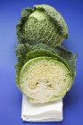 Savoy cabbages whole and half — Stock Photo