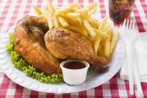 Roasted chicken with fried chips — Stock Photo