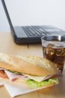 Sub sandwich and cola — Stock Photo