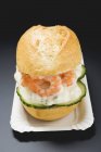 Bread roll filled with shrimps — Stock Photo