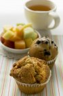 Muffins on breakfast table — Stock Photo