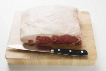 Sirloin steak on board — Stock Photo