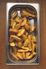 Gebratene Kartoffelkeile — Stockfoto