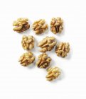 Several shelled walnuts — Stock Photo