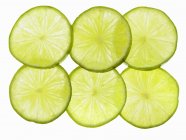 Six tranches de citron vert — Photo de stock