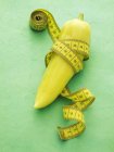 Pointed pepper with tape measure — Stock Photo