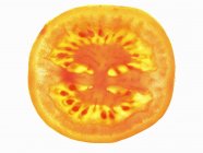 Fatia de tomate com retroiluminação — Fotografia de Stock