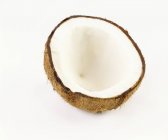 Mezza noce di cocco su bianco — Foto stock