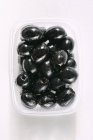 Aceitunas negras apedreadas - foto de stock