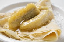 Crpes with caramelised bananas — Stock Photo