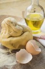 Pasta dough and eggshell — Stock Photo