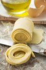 Homemade ribbon pasta on table — Stock Photo