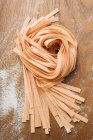 Homemade orange ribbon pasta — Stock Photo