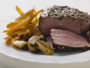 Peppered steak with chips — Stock Photo