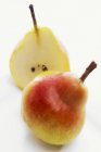 Whole and half Williams pears — Stock Photo
