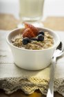 Oatmeal porridge with berries — Stock Photo