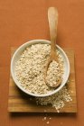 Rolled oats in a bowl — Stock Photo