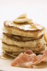 Pancakes with butter, bacon and maple syrup — Stock Photo