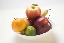Яблоки и цитрусовые — стоковое фото