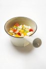 Fruit salad in small pan — Stock Photo
