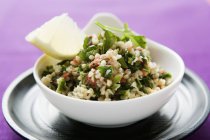 Pearl barley and parsley salad in a bowl — Stock Photo