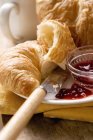Croissant with jam — Stock Photo