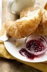 Croissant with jam — Stock Photo