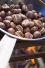 Roasting chestnuts, close-up — Stock Photo