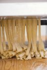 Making homemade ribbon pasta — Stock Photo