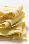 Bunch of raw Pappardelle pasta — Stock Photo