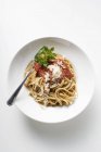 Homemade ribbon pasta with tomato sauce — Stock Photo
