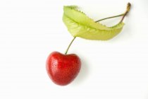 Fresh cherry with leaf — Stock Photo