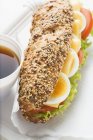 Granary roll filled with egg — Stock Photo