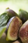 Several half and whole figs — Stock Photo