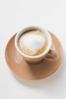 Xícara de café expresso com espuma de leite — Fotografia de Stock