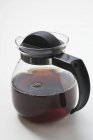 Black coffee in glass jug — Stock Photo