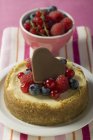 Mini-cheesecake with mixed berries — Stock Photo