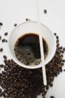 Café preto em copo de plástico — Fotografia de Stock