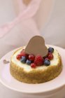 Mini-cheesecake with mixed berries — Stock Photo