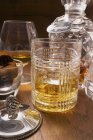 Cognac and whisky in glasses — Stock Photo