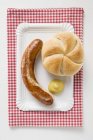 Sausage bratwurst with mustard — Stock Photo