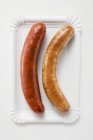 Cooked bratwursts sausages — Stock Photo