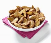 Roast potato wedges — Stock Photo
