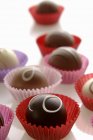 Chocolates with icing — Stock Photo